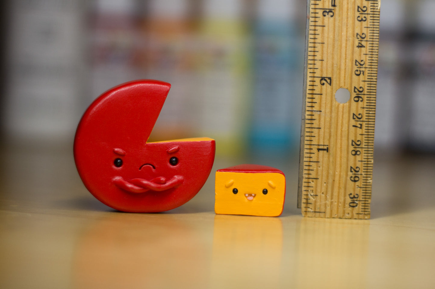 Grumpy Cheddar Cheese Wheel with Little Buddy Slice