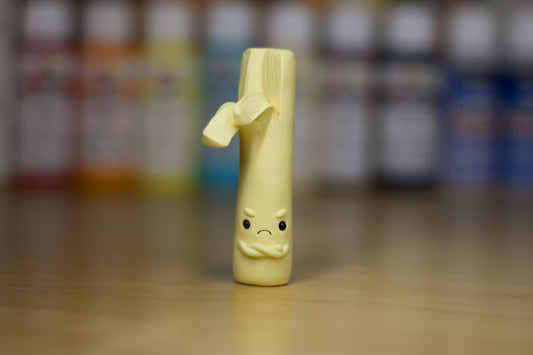 Grumpy String Cheese Figurine