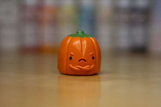 Grumpy Pumpkin Candy Figurine