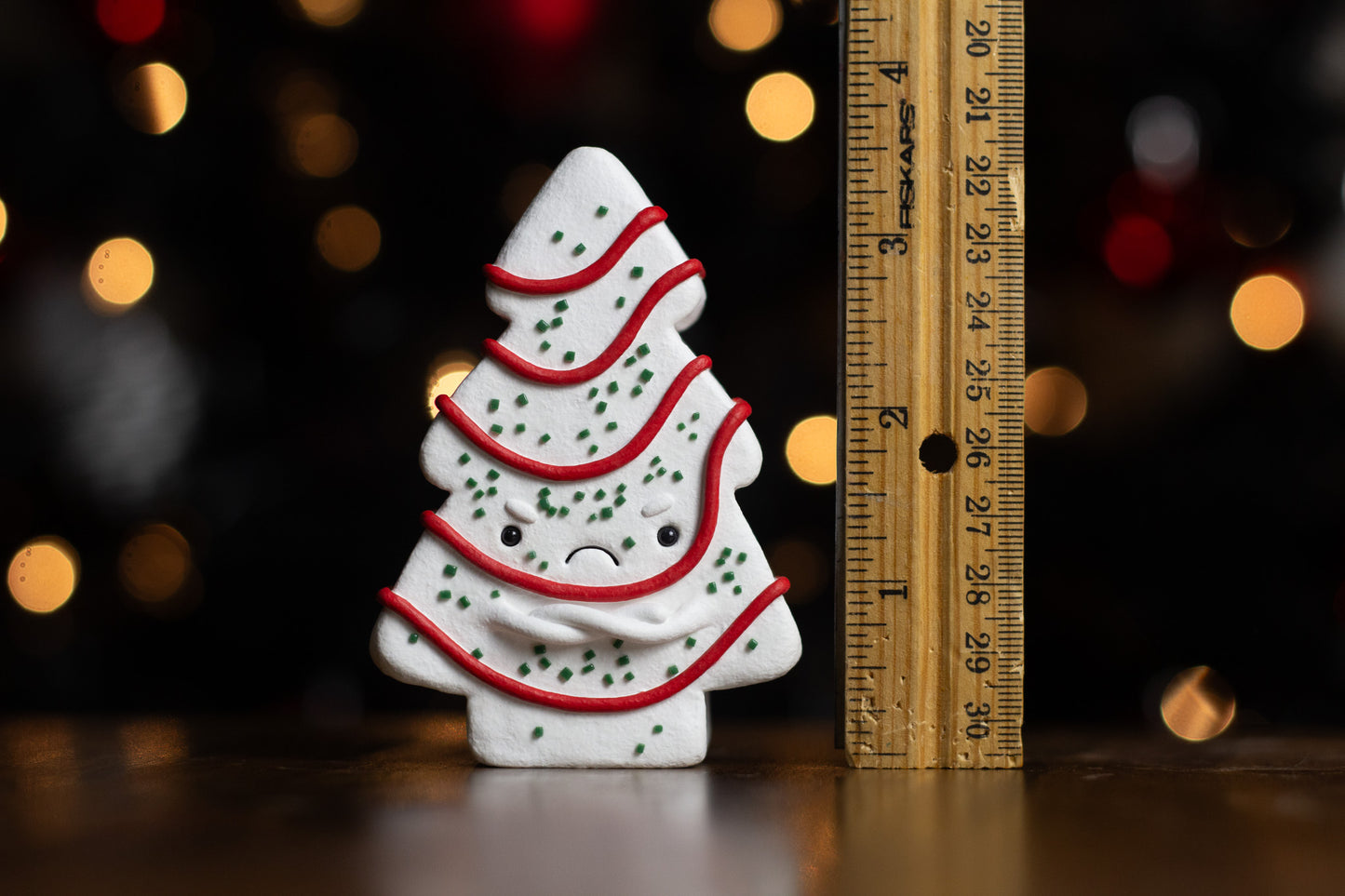 Grumpy Christmas Snack Cake Figurine