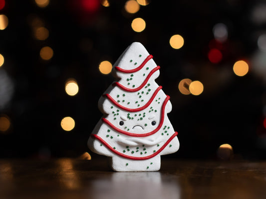 Grumpy Christmas Snack Cake Figurine