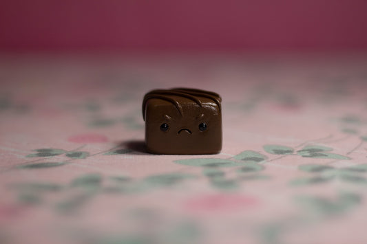 Grumpy Milk Chocolate with Strawberry Filling Figurine