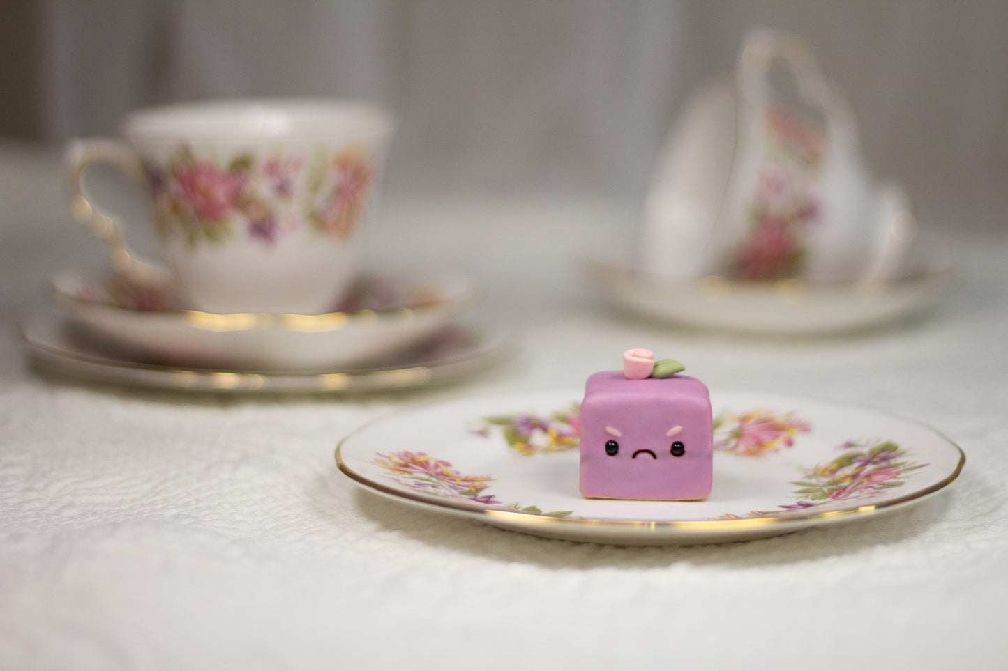 Grumpy Purple Petit Four Figurine