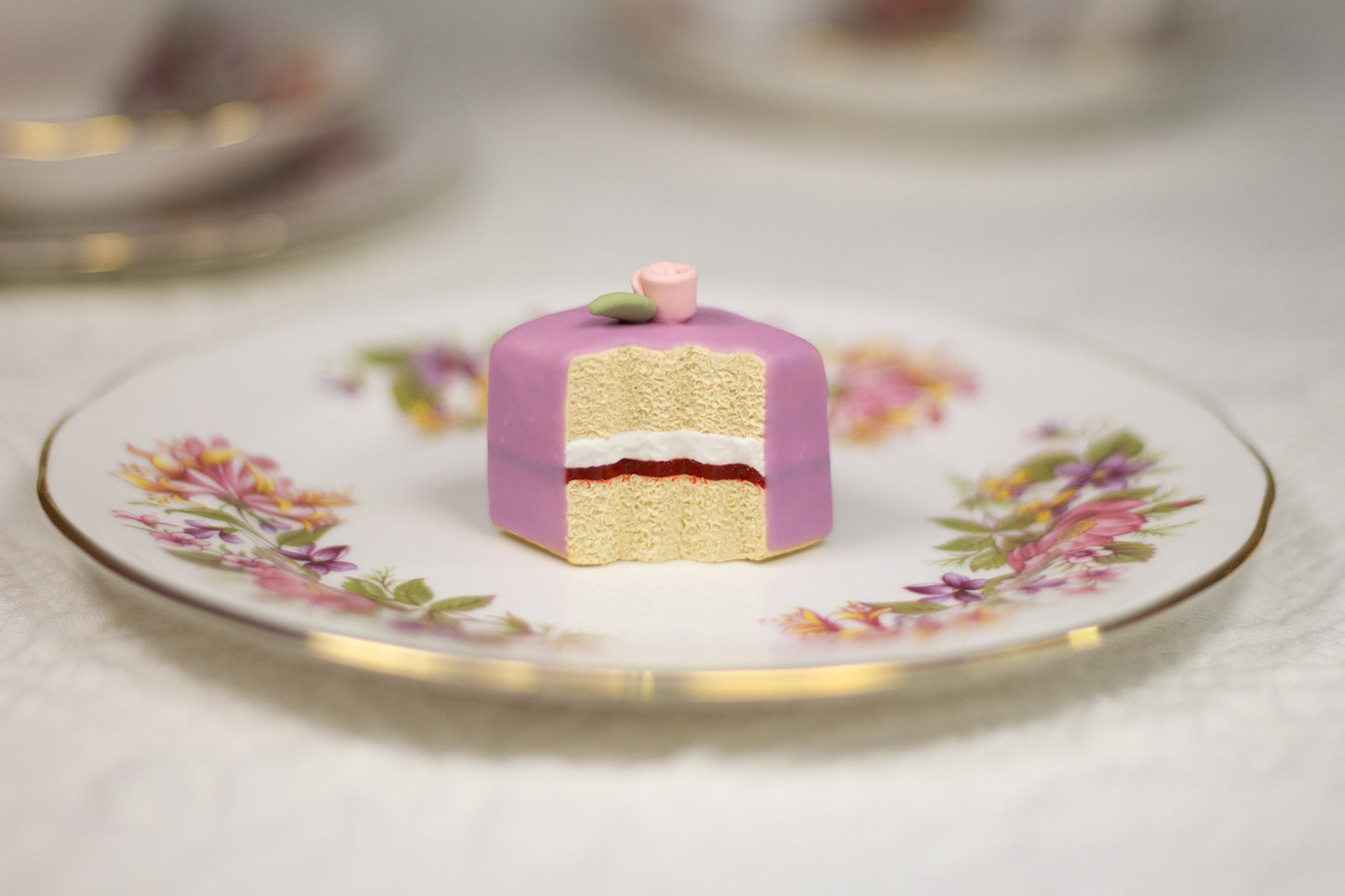 Grumpy Purple Petit Four Figurine
