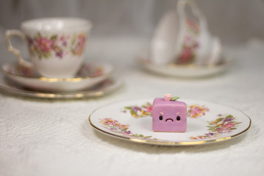 Grumpy Purple Petit Four Figurine