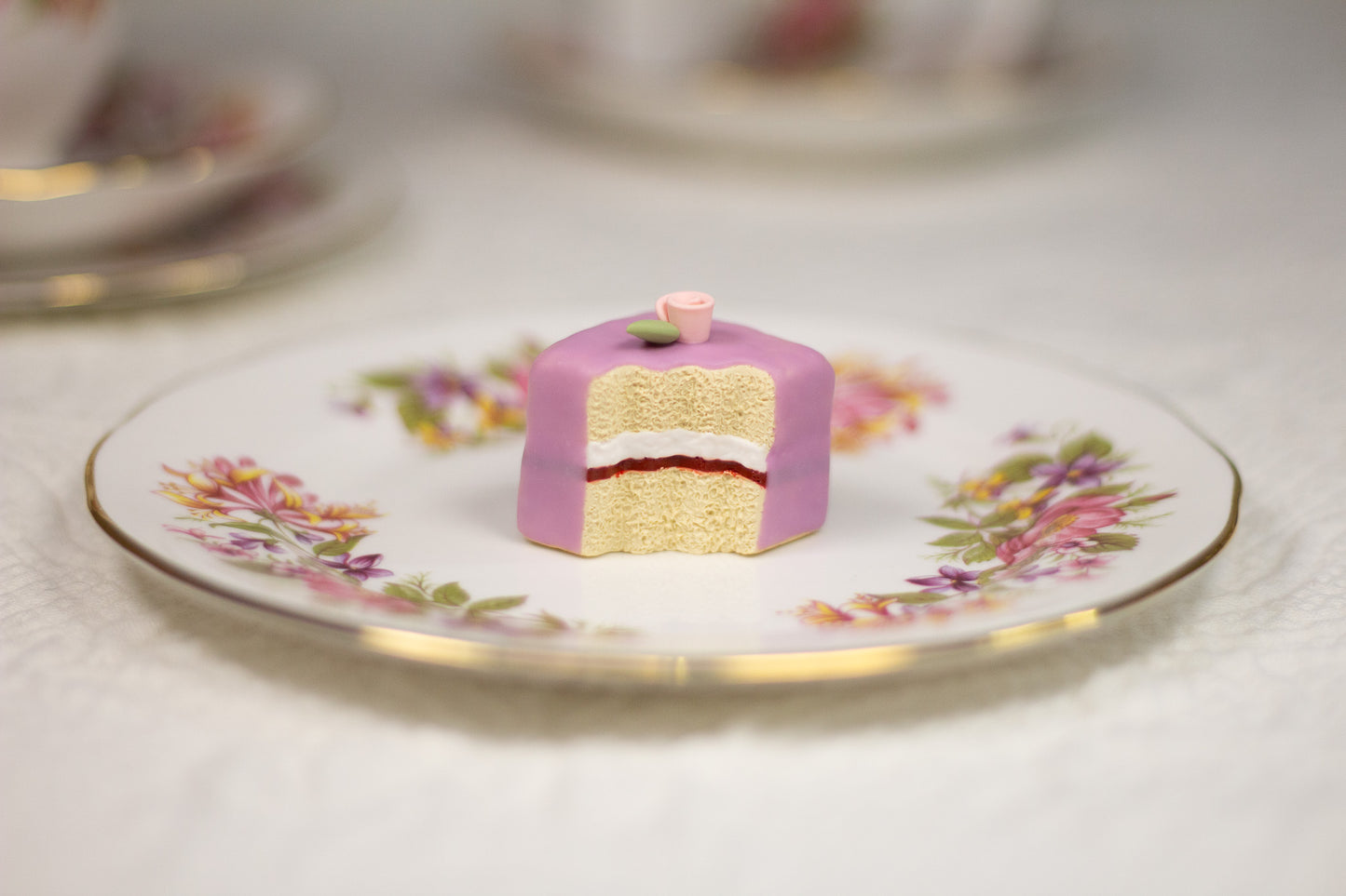 Grumpy Purple Petit Four Figurine