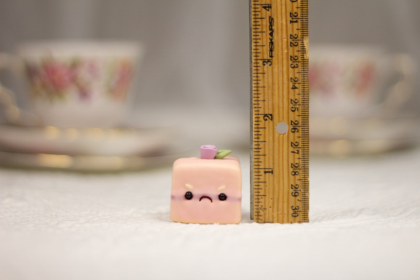 Grumpy Pink Petit Four Figurine