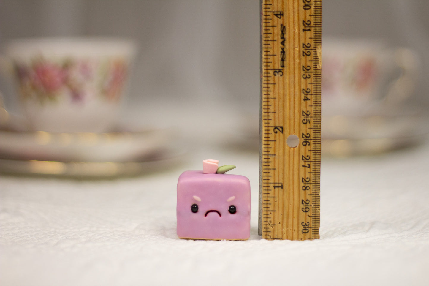 Grumpy Purple Petit Four Figurine