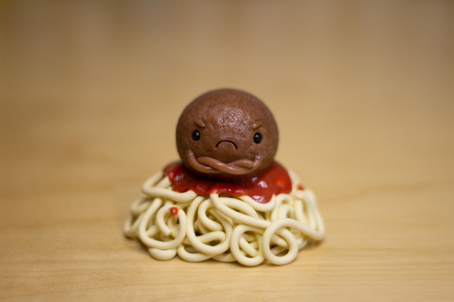 Grumpy Meatball on Top of Spaghetti Figurine