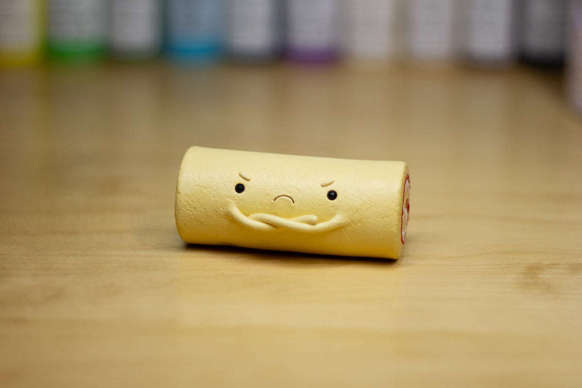 Grumpy Strawberry Roll Cake Figurine