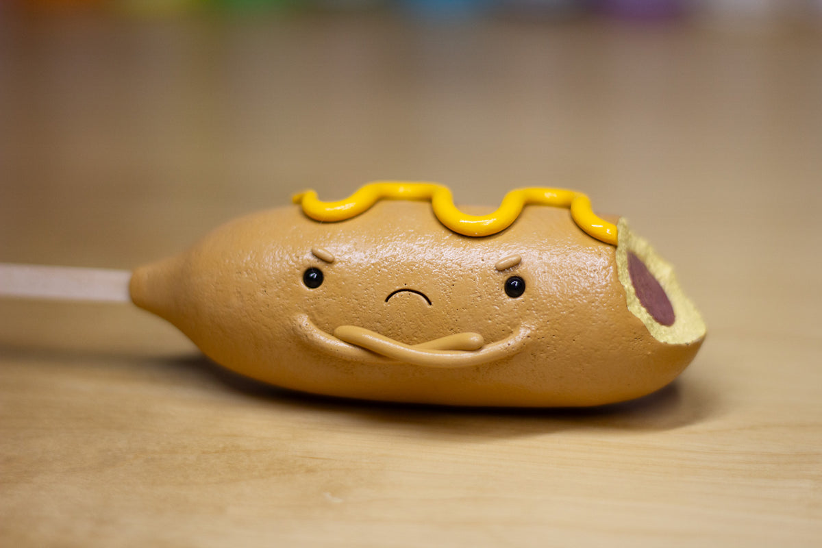 Grumpy Corn Dog With Mustard Figurine