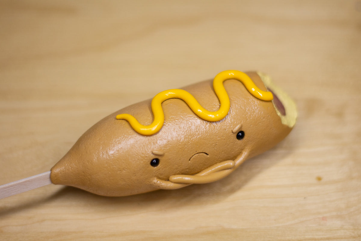 Grumpy Corn Dog With Mustard Figurine